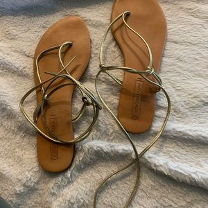 BCBGMax flat size 10 sandal wraps around ankle. Worn twice. Excellent co…